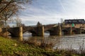 Old brick arch bridge over Tauber river in Tauberrettersheim, Germany