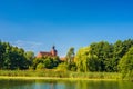 Old baroque church in countryside near lake Royalty Free Stock Photo