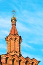 Old brick bell tower of the Orthodox Church against the blue sky Royalty Free Stock Photo