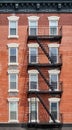 Old brick building with fire escape, New York City, USA Royalty Free Stock Photo