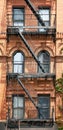 Old brick building with fire escape, New York City, USA Royalty Free Stock Photo