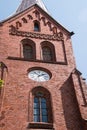 This old brick building with a large on its front wall as seen in this tourist town on this date Royalty Free Stock Photo