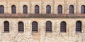 Old brick building with many old windows