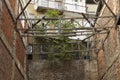 Old brick buildings with wooden bulks, windows Royalty Free Stock Photo