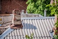 Old brick chimney on a roof of house Royalty Free Stock Photo