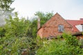 Old brick cottage in a small town Royalty Free Stock Photo