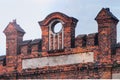 Old brick facade of an old factory or factory building, blue sky on the background Royalty Free Stock Photo