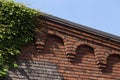 Old Brick Factory Wall and Roofline - Arches and Ivy