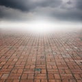 Old brick floor and rainclouds for background Royalty Free Stock Photo