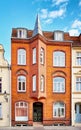 Old brick house with a rare bay window and a small spire in the old town of Wismar Royalty Free Stock Photo