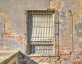 Old brick-lined window in old abandoned house.