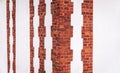 Old brick restored wall. Background white, red brick.