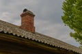 Old brick roof pipe Royalty Free Stock Photo