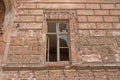 Old brick ruin wall with window