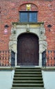 Old brick stone facade, portal and windows in Dutch style