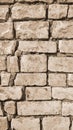 Old Brick Stone Wall. Graphic Bricklaying Construction. Sepia Background Vertical Photo. Monotone, Gloomy Retro Vintage Brickwork Royalty Free Stock Photo