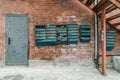 Old brick wall with antique mailboxes Royalty Free Stock Photo