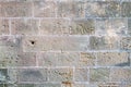 Old brick wall background with carved graffiti. Royalty Free Stock Photo