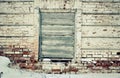 Old brick wall in the center of the window, laid nailed old boar Royalty Free Stock Photo