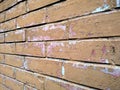 Old brick wall covered with cracked paint Royalty Free Stock Photo