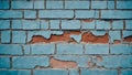 Old brick wall with cracked blue paint.