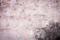 old brick wall. cracked concrete. pink, brown texture. vintage background. rustic style, mold. Royalty Free Stock Photo