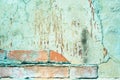 Old brick wall. cracked concrete. turquoise, blue, brown texture. vintage background Royalty Free Stock Photo