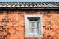 Old Brick Wall with Grey Window