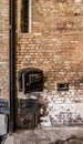 Old brick wall with an industrial chimney Royalty Free Stock Photo