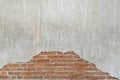 Old brick wall with peeling plaster, grunge background. Copy space for text. Royalty Free Stock Photo