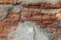 Old brick wall with peeling plaster grunge background Royalty Free Stock Photo