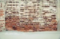 Old brick wall red brick and white plaster covered by whitewash Royalty Free Stock Photo