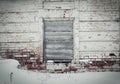 Old brick wall in the center of the window, laid nailed old boar Royalty Free Stock Photo