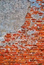 Old brick wall with ruined plaster Royalty Free Stock Photo