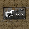 Old brick wall rusty metal sheet iron rock guitar Royalty Free Stock Photo