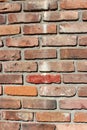 Old brick wall with several colors of brick showcasing craftsmanship of work Royalty Free Stock Photo