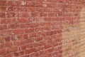 Old shabby chic pink and beige color brick wall texture with a blotchy abstract look Royalty Free Stock Photo