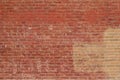 Old shabby chic pink and beige color brick wall texture with a blotchy abstract look Royalty Free Stock Photo