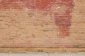 Old shabby chic pink and beige color brick wall texture with a blotchy abstract look Royalty Free Stock Photo