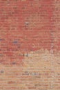 Old shabby chic pink and beige color brick wall texture with a blotchy abstract look Royalty Free Stock Photo