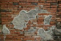 Old Brick Wall Texture Background with Peeling White Paint. Royalty Free Stock Photo