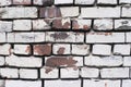 Old brick wall. Uneven surface. Large cracks Royalty Free Stock Photo