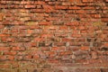 Old brick wall weathered and broken bricks, background Royalty Free Stock Photo