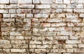 Old brick wall with white paint background texture close up , industrial detail Royalty Free Stock Photo