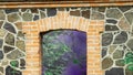 brick wall and window in the garden - vintage effect picture style Royalty Free Stock Photo