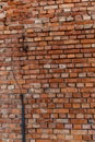 Old red brick wall damaged lightning rod collapsing brick wall Royalty Free Stock Photo