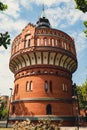 Old brick water tower in Bydgoszcz. The Water Tower in Bydgoszcz, Poland, historic city landmark and viewpoint, Neo Royalty Free Stock Photo