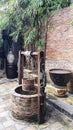 An old brick well in the middle of an old house Royalty Free Stock Photo