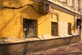 Old brick yellow building on a sunny day. Royalty Free Stock Photo
