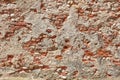 Old bricks and concrete wall texture background, sunlight Royalty Free Stock Photo